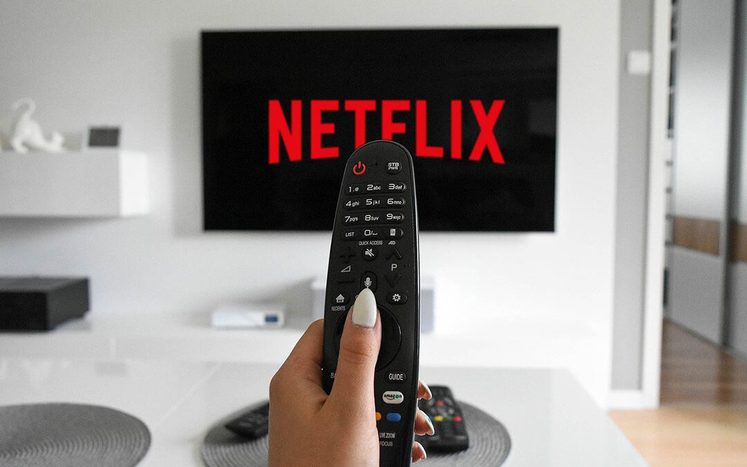 Image of remote and NETFLIX on tv screen
